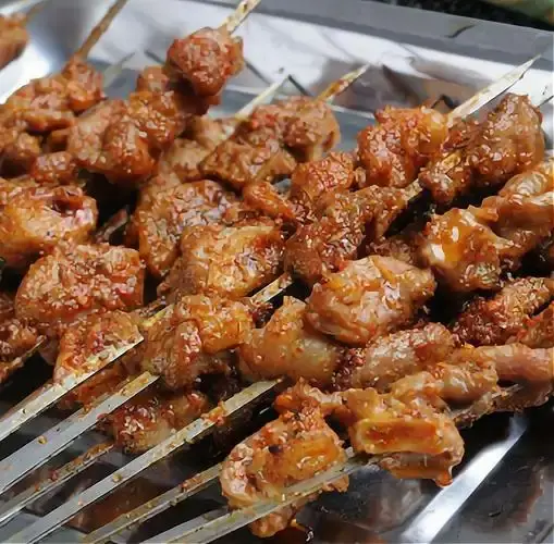 Grilled lamb skewers at a festival feast